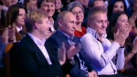 Премьер министр В.В.Путин на юбилейной игре КВН в первом ряду рядом с Масляковым младшим и капитаном Незолотой молодежи